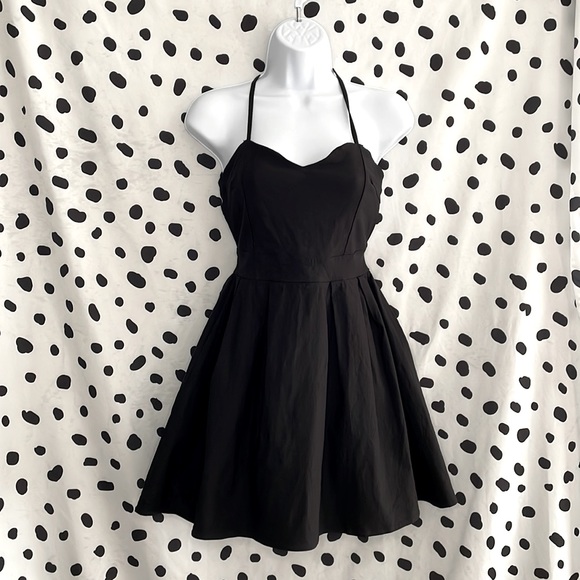 Lulus Dresses & Skirts - LULU’S criss-cross mini black dress